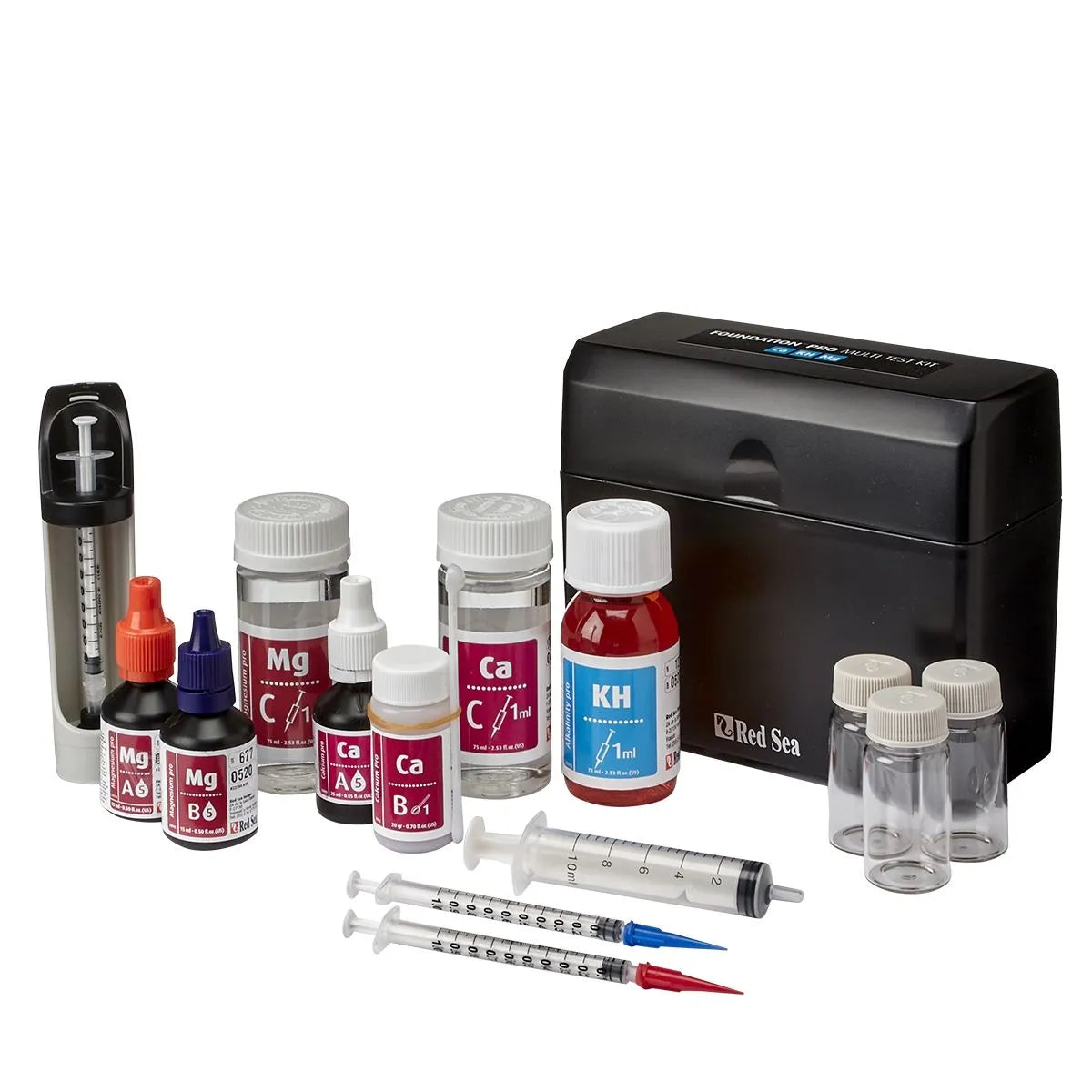 Collection of aquarium test kits and supplies on a white background