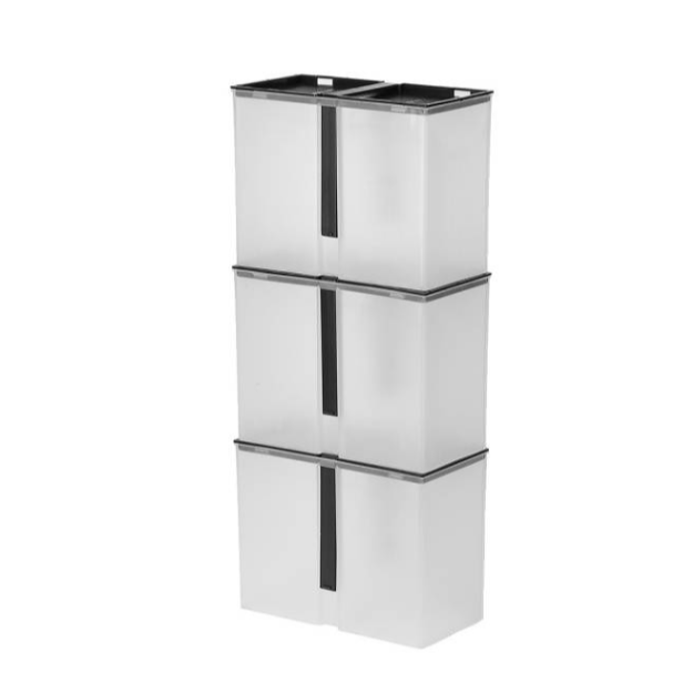 Set of three white cylindrical planters with black accents on a white background