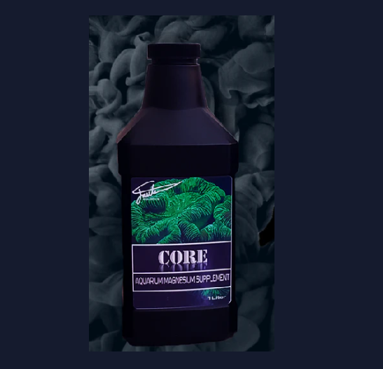 Bottle of 'CORE' aquarium magnesium supplement with a green label on a dark textured background