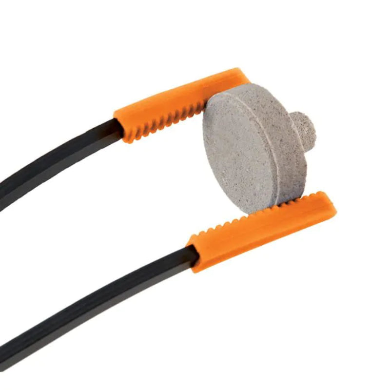 black tongs with orange tips holding a frag plug for saltwater reef aquariums as a tool on a white background