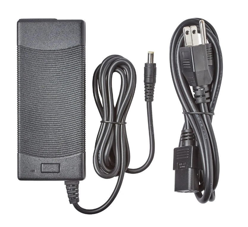 Black power adapter with cables on a white background