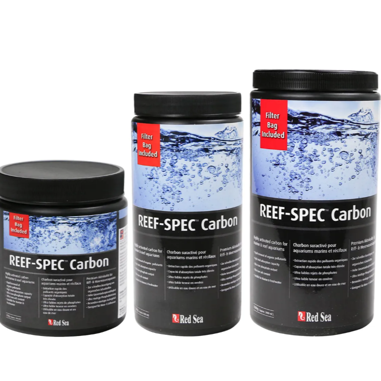 Three containers of Red Sea Reef-Spec Carbon on a white background
