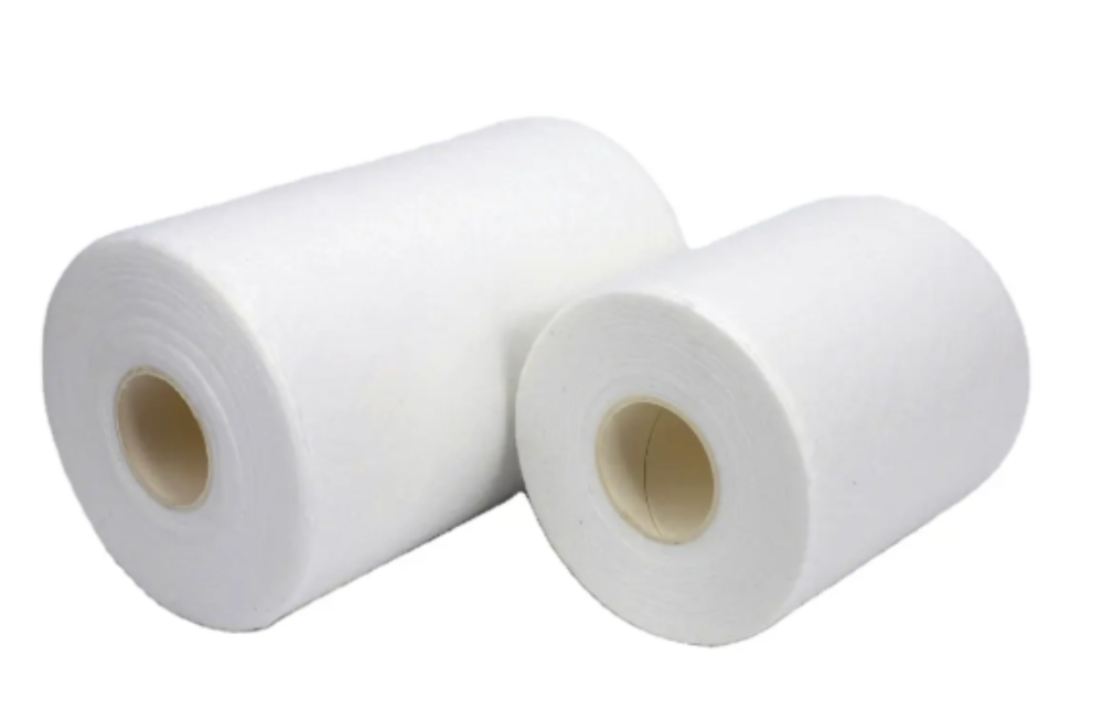 Two rolls of white fleece, likely made of polyester, displayed against a white background.