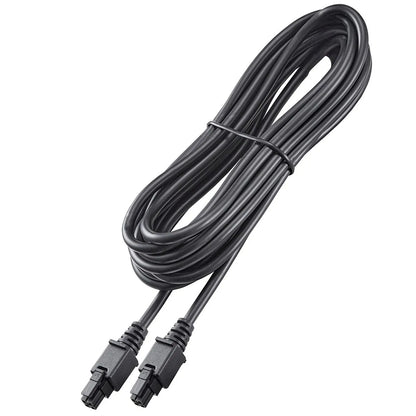 Coiled black cable with connectors on a white background