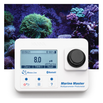 Marine Master multiparameter photometer with digital display against a coral reef background