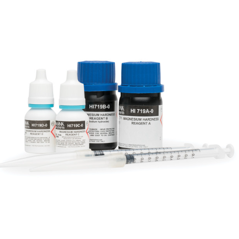 Chemical reagent bottles with a syringe on a white background