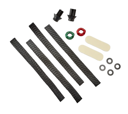 Set of mechanical components including black straps, small black and red parts, and other accessories on a white background.