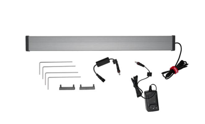 LED strip light with mounting hardware on a white background