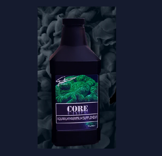 Bottle of 'CORE' aquarium magnesium supplement with a green label on a dark textured background