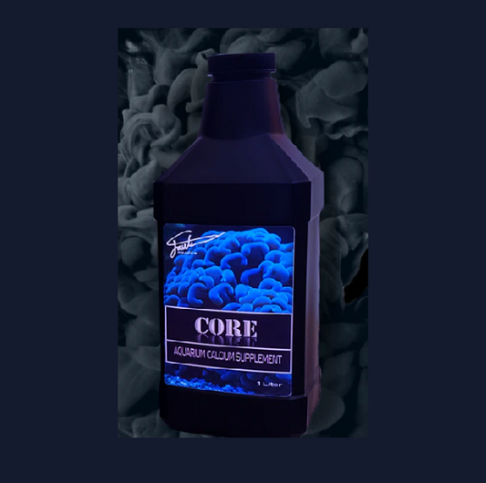 Aquarium calcium supplement bottle with blue glow against a dark background