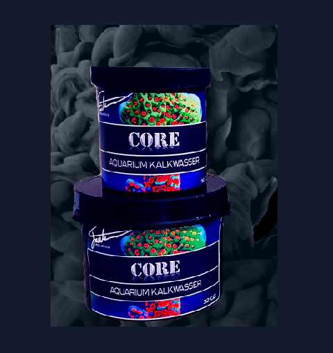 Two stacked containers of 'CORE Aquarium Kalkwasser' on a dark background
