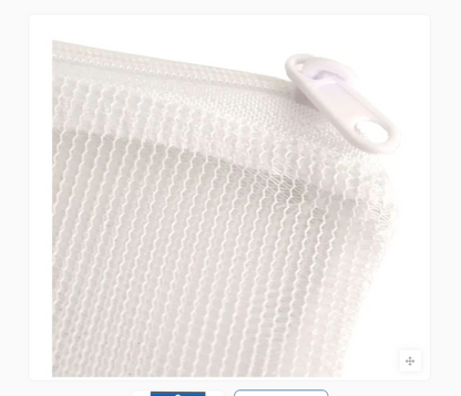 White mesh laundry bag with a button on a white background