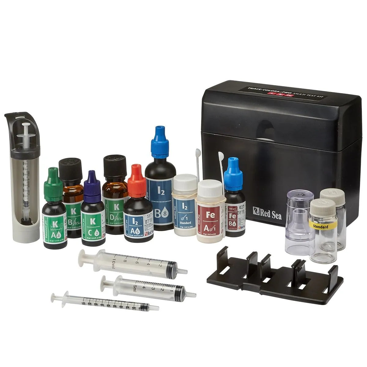 Marine aquarium maintenance kit with bottles, syringes, and a black box on a white background